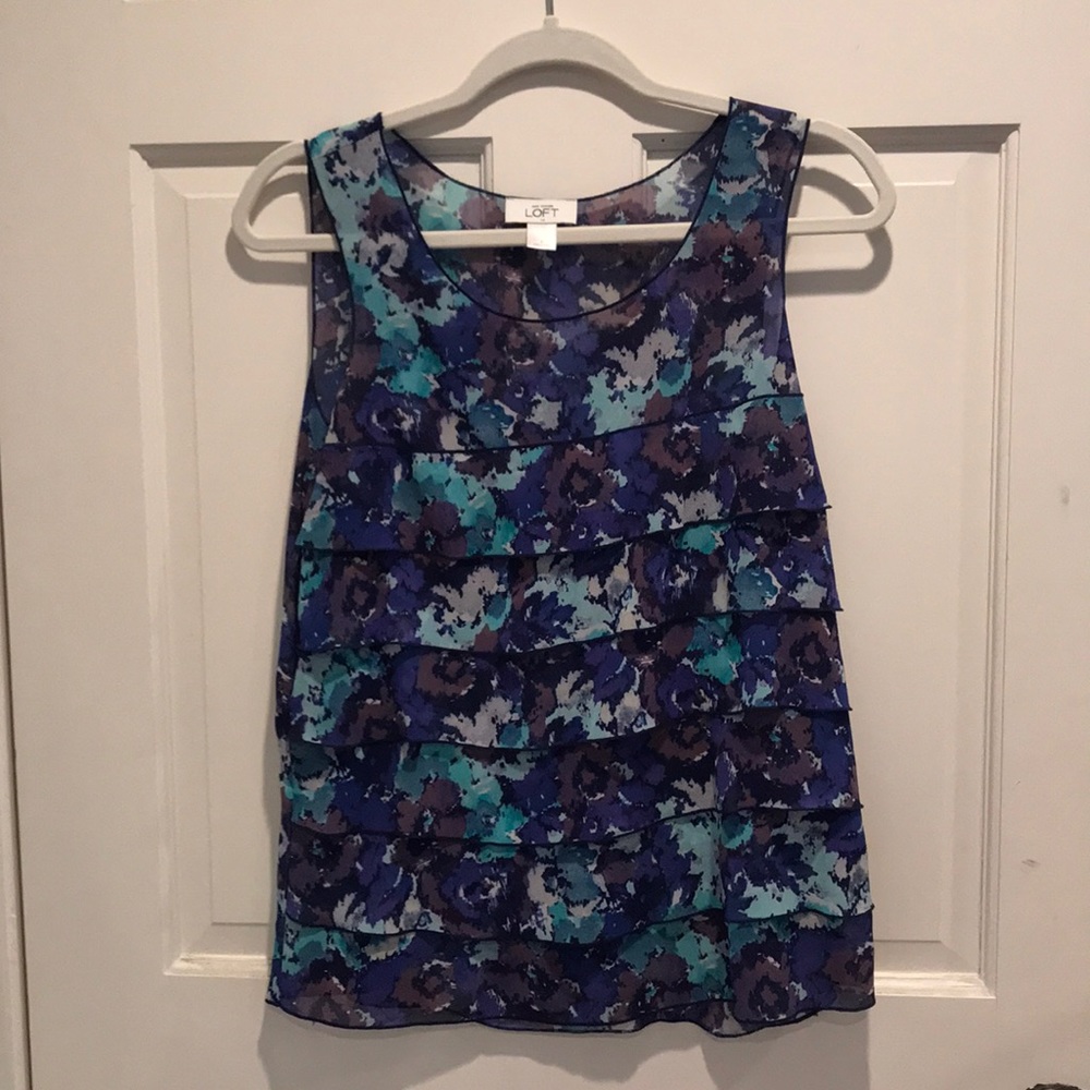 Ruffled sleeveless top